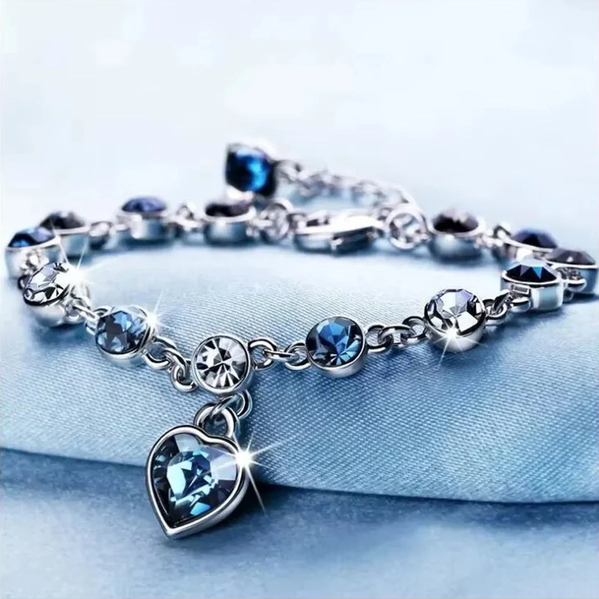 Bracelet porte-bonheur en argent - Breloque cœur en cristal bleu pour femme