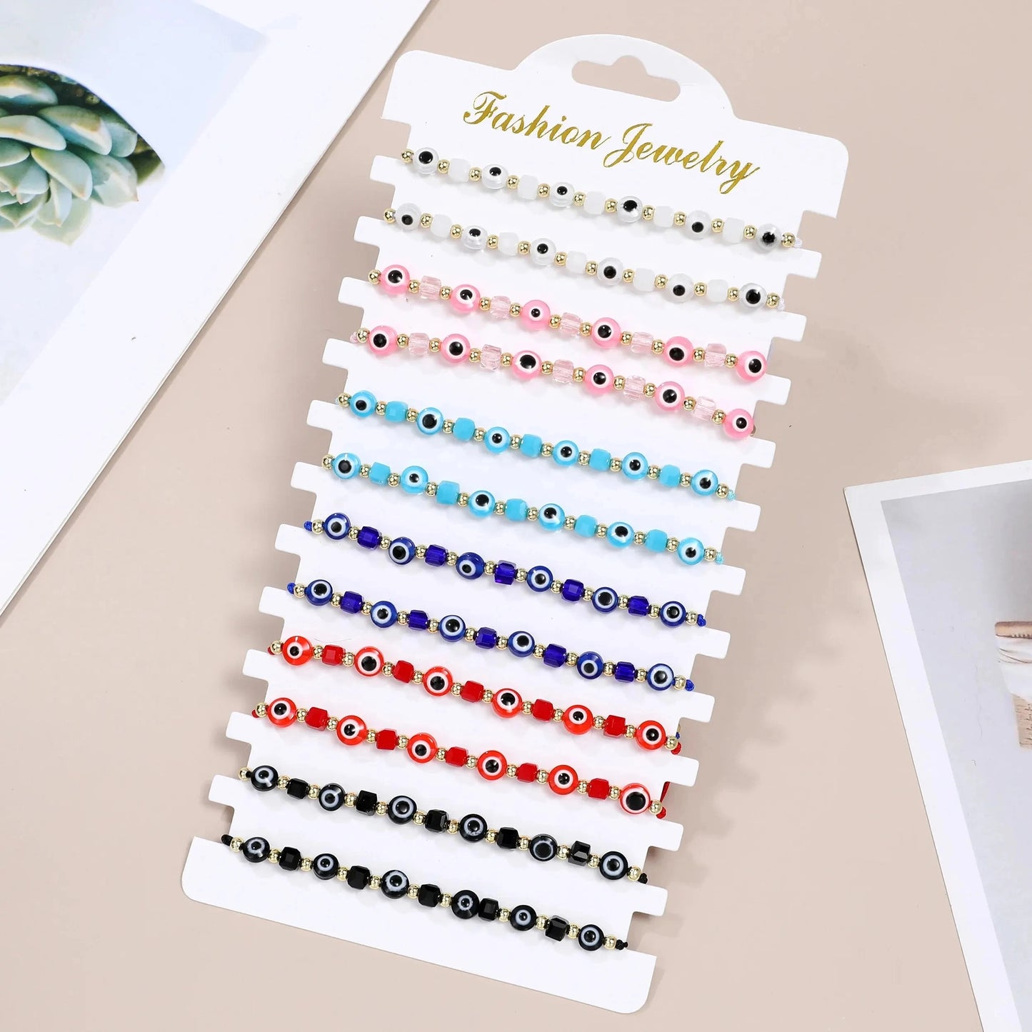 مجموعة أساور كريستال عين الشر - 12 قطعة من أساور الصلاة المصنوعة يدويًا