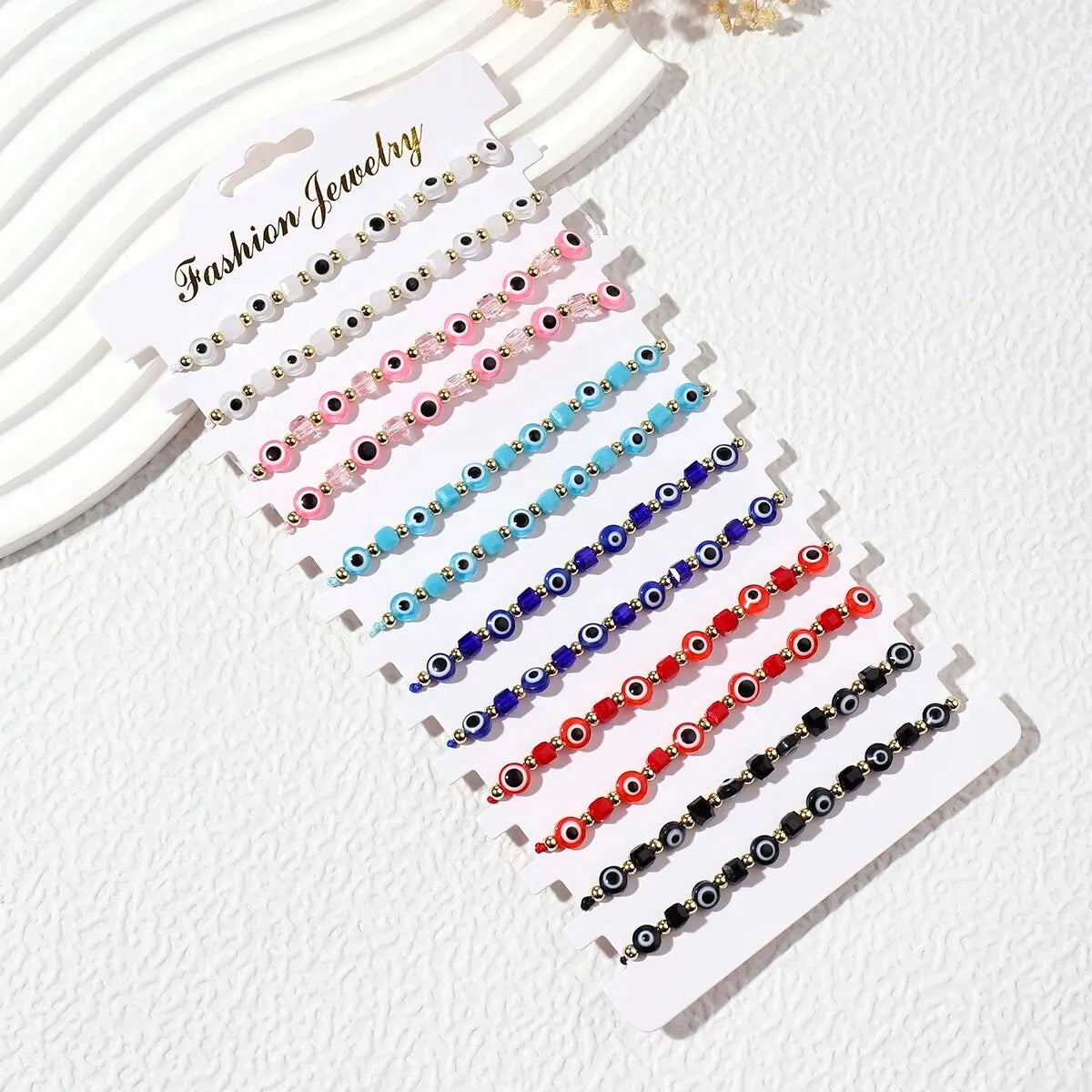 مجموعة أساور كريستال عين الشر - 12 قطعة من أساور الصلاة المصنوعة يدويًا
