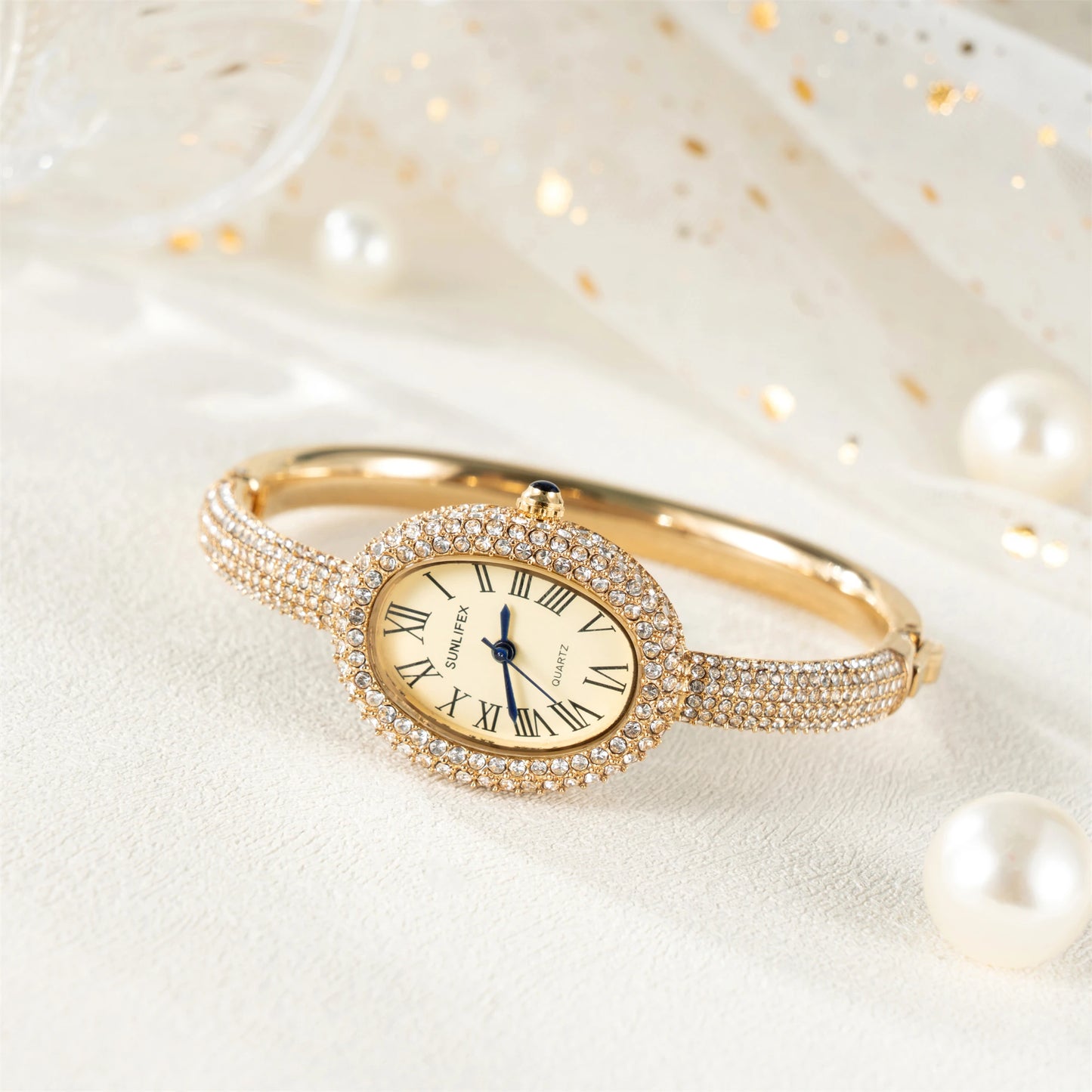 ساعة نسائية فاخرة - ساعة بيضاوية مرصعة بأحجار الراين بأرقام رومانية ومقاومة للماء